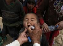 an-afghan-child-receives-polio-vaccination-drops-near-the-site-of-a-landslide-at-the-argo-district-in-badakhshan-province-may-4-2014-reuters-mohammad-ismail