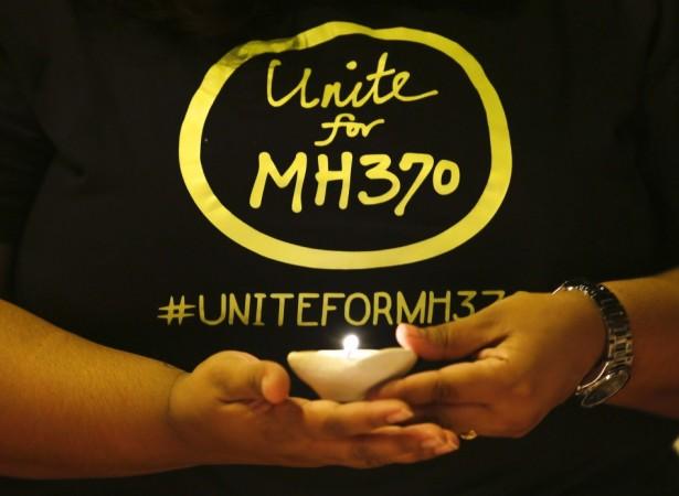 The girlfriend of an American passenger on board the missing Malaysia plane MH370 has received death threat, mysterious calls and two break-ins (Photo: Reuters)