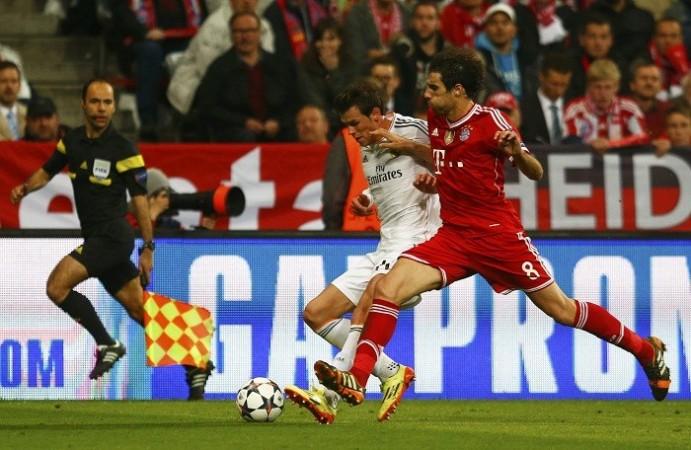 Bayern Munich midfielder Javi Martinez challenges Real Madrid forward Gareth Bale during their Champions League semifinal second leg, 29 April. Reuters Javi Martinez Gareth Bale Bayern Munich Real Madrid