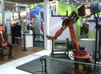 a-robot-draws-peoples-portraits-in-cebit-high-tech-fair