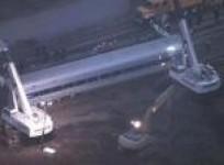 cranes-start-moving-derailed-bronx-commuter-train-cars