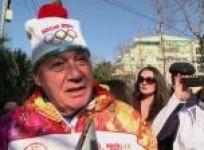russian-journalist-relays-olympic-torch-in-sochi