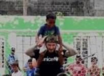 beckham-lifts-sprits-of-young-philippines-typhoon-survivors