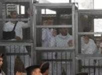 al-jazeera-journalists-caged-in-court-for-falsehood-trial