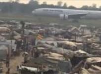displaced-persons-arrive-at-bangui-airport-in-car