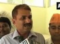 bjp-goes-full-throttle-with-saffron-caps-modi-badges-t-shirts-to-woo-voters
