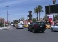 election-posters-crowd-baghdad-as-campaign-kicks
