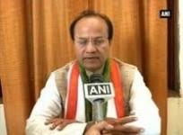 narendra-modi-flashes-bjps-symbol-congress-demands-his-disqualification