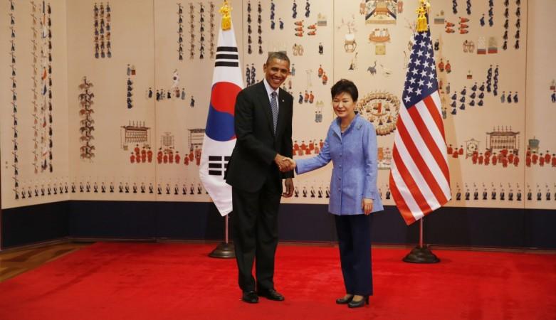 U.S. President Obama shakes hands with South Korean President Park in the Blue House in Seoul