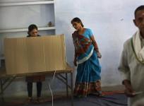 Women at a polling station in the final phase of the general election in Varanasi