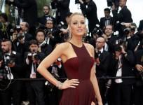 Actress Blake Lively poses on the red carpet as she arrives for the opening ceremony of the 67th Cannes Film Festival in Cannes