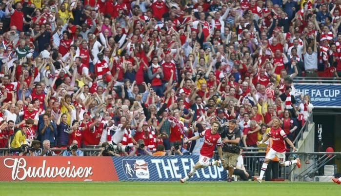 Arsenal midfielder Aaron Ramsey celebrates after scoring the winner against Hull City in the FA Cup final, 18 May Aaron Ramsey Arsenal FA Cup Final