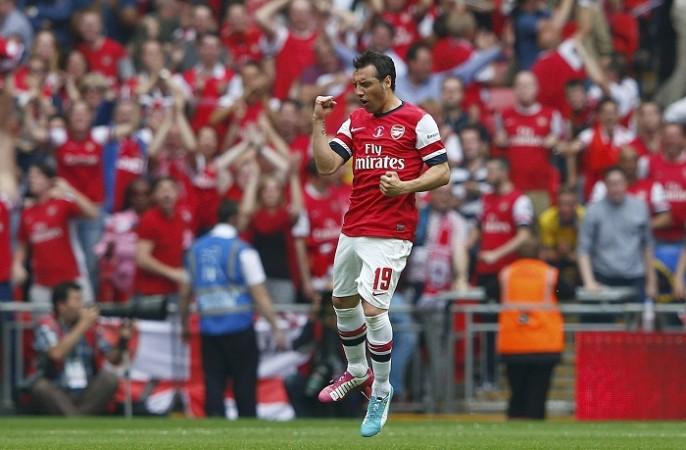 Arsenal's Santi Cazorla celebrates after scoring his team's first goal against Hull City during their FA Cup final. Santi Cazorla