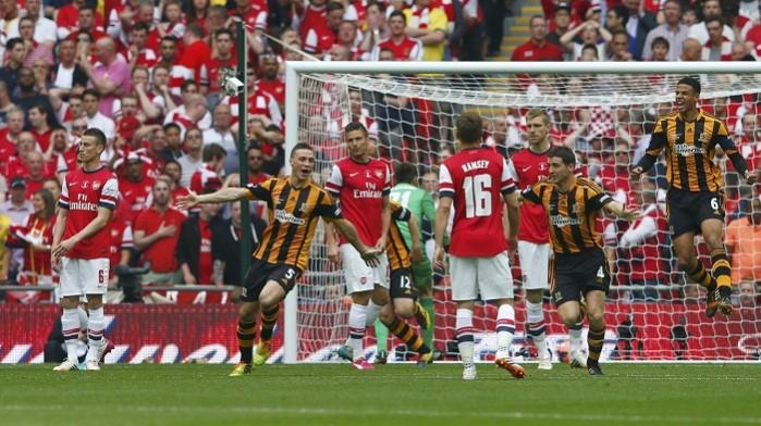 Hull City's James Chester celebrates his team's first goal during their FA Cup final match. James Chester
