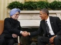 U.S. President Barack Obama shakes hands with Manmohan Singh in the Oval Office of the White House in Washington (Reuters file)
