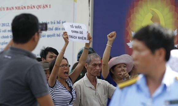 Protesters chant anti-China slogans as they march during an anti-China protest in Vietnam's southern Ho Chi Minh city (Reuters)