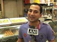 customers-make-beeline-to-see-sweets-bearing-modis-face