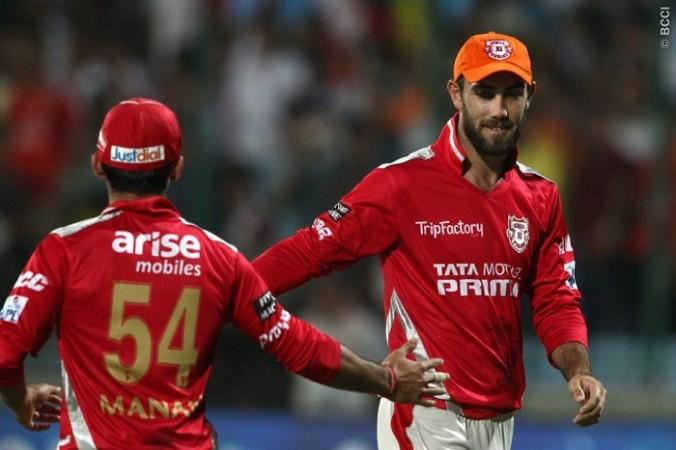 Manan Vohra congratulates his Kings XI teammate Glenn Maxwell for taking a catch to dismiss Delhi Daredevils batsman Wayne Parnell during Match 45 of IPL 2014. Glenn Maxwell Kings XI Punjab