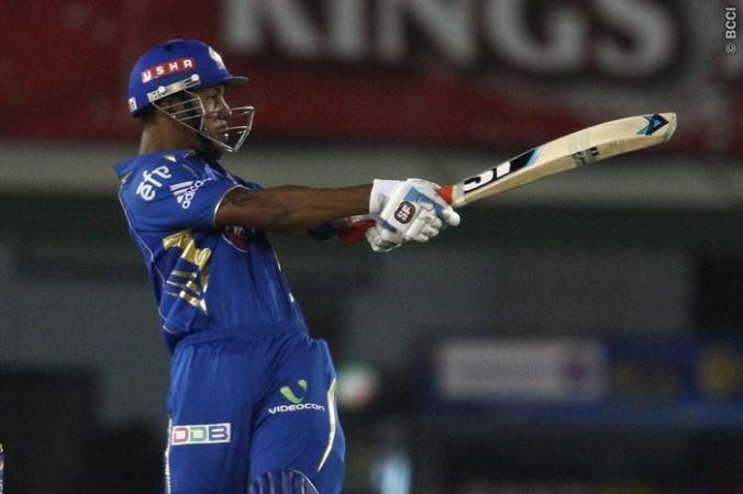 Mumbai Indians opener Lendl Simmons in a punishing mood during his unbeaten century against the Kings XI Punjab in their IPL 2014 game, 21 May. Lendl Simmons Mumbai Indians