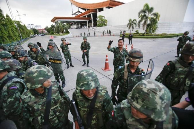 Thai soldiers take control during a coup at the Army Club where Thailand's army chief held a meeting with all rival factions in central Bangkok Thailand Coup