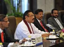 Sri Lankan president Mahinda Rajapaksa has invited the leader of the island country's Tamil province to come with him for Narendra Modi's oath taking ceremony.