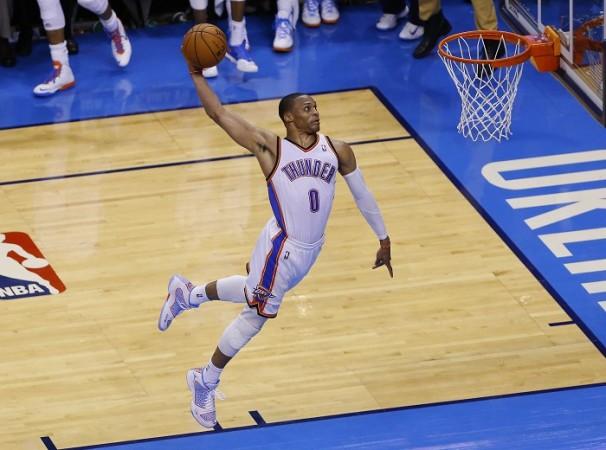 Oklahoma City Thunder's Russell Westbrook goes up for a dunk against the San Antonio Spurs. Russell Westbrook