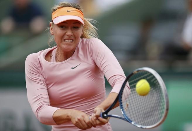 Maria Sharapova hits a return against Ksenia Pervak during at the French Open. Maria Sharapova