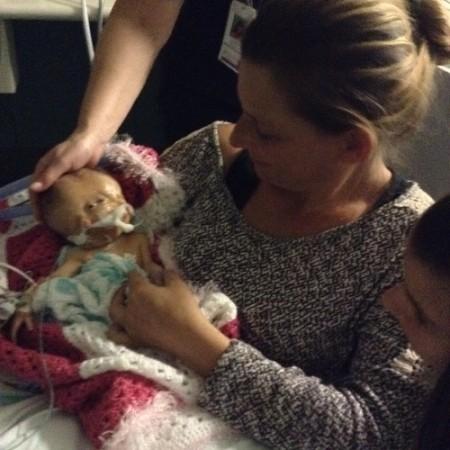 Renee Young with Hope & Faith Renee Young with her conjoined twins