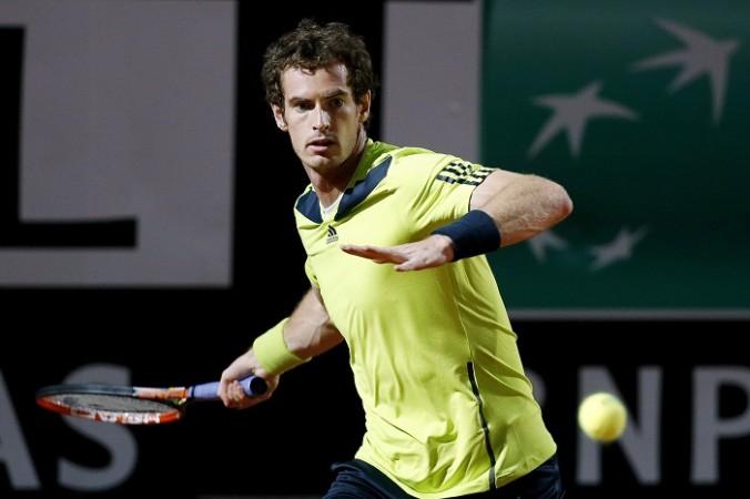 Andy Murray of Britain hits a return. Andy Murray