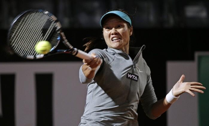Li Na of China hits a return. Li Na
