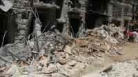 air-raids-on-syrias-aleppo-kill-scores-in-24-hours