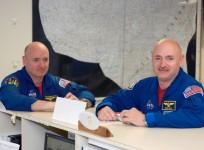Astronauts Mark Kelly (right), STS-124 commander, and Scott Kelly are pictured in the check-out facility at Ellington Field near NASA's Johnson Space Center as the STS-124 crewmembers prepare for a flight to Kennedy Space Center in NASA T-38 trainer jets.