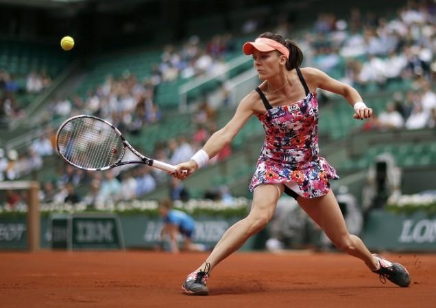 Agnieszka Radwanska returns a backhand to Ajla Tomljanovic during their match at the French Open. Agnieszka Radwanska