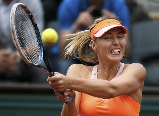 Maria Sharapova hits a return at the French Open. Maria Sharapova French Open