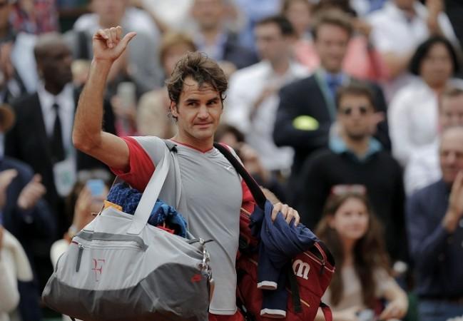 Roger Federer leaves the court after being defeated by Ernests Gulbis. Roger Federer French Open