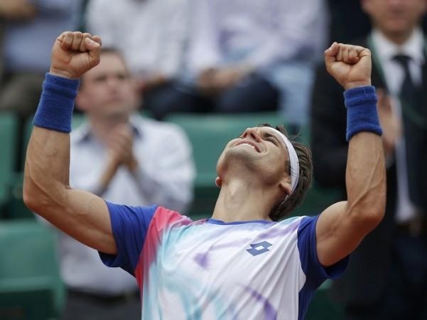 David Ferrer celebrates after winning his match against Kevin Anderson at the French Open. David Ferrer French Open