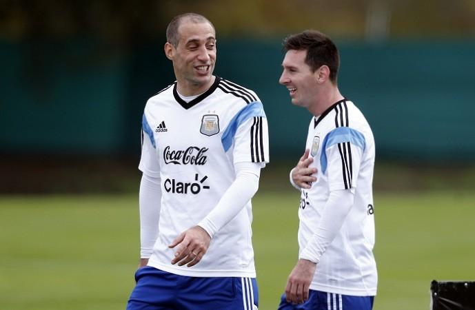 Argentina players Pablo Zabaleta and Lionel Messi share a laugh during a training session in Buenos Aires, 31 May Pablo Zabaleta Lionel Messi Argentina