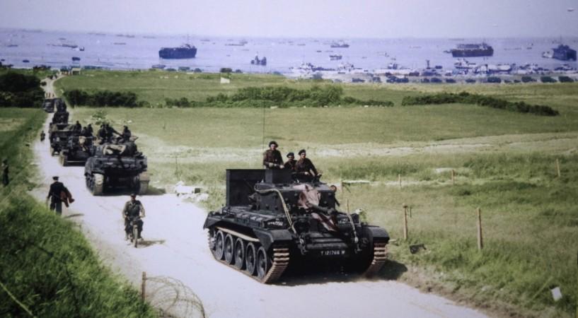 Handout photo of a Cromwell tank leading a British Army column inland from Gold Beach after landing on D-Day in Ver-sur-Mer