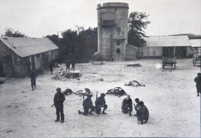 Handout photo of U.S. Army troops making a battle plan near the D-Day landing zone of Utah Beach in Les Dunes de Varreville