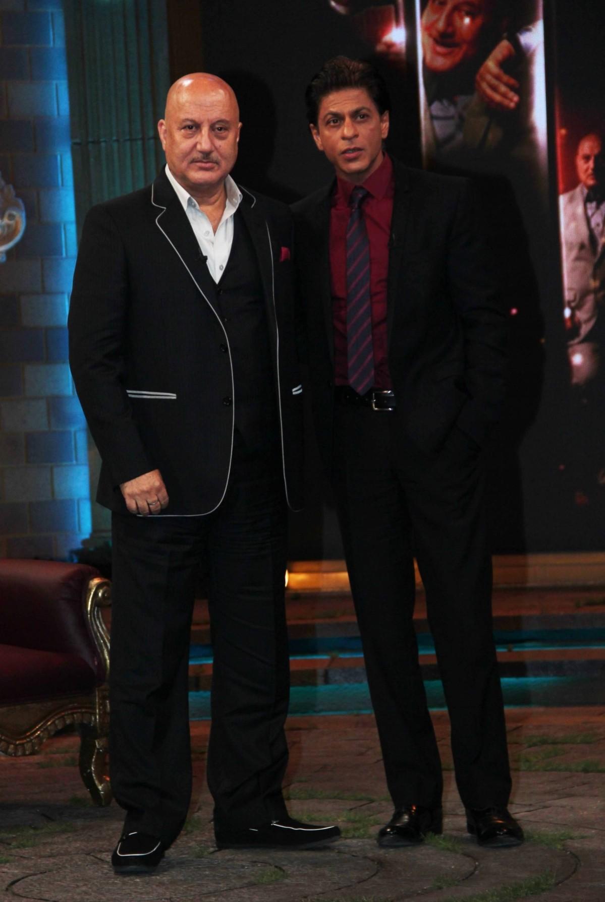 Shah Rukh Khan and Anupam Kher pose for a photo on the sets of talk show 'Kucch Bhi Ho Sakta Hai' Shah Rukh Khan and Anupam Kher