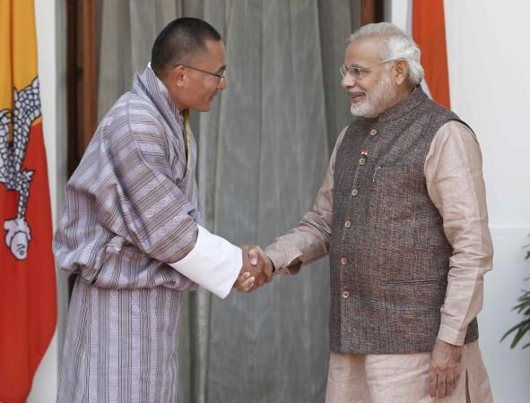 India's PM Modi shakes hands with his Bhutanese counterpart Tobgay before the start of their bilateral meeting in New Delhi (2014-05-27) India's PM Modi shakes hands with his Bhutanese counterpart Tobgay before the start of their bilateral meeting in New Delhi (2014-05-27)
