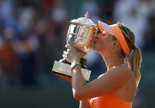 Maria Sharapova kisses the French Open trophy after defeating Simona Halep in the final, 7 June Maria Sharapova French Open
