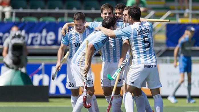 Argentine players celebrate after scoring against South Korea. Argentina Hockey team