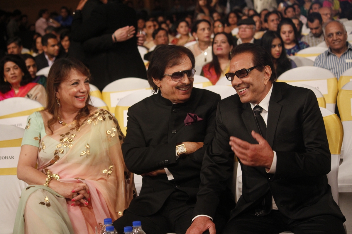 Actor Sanjay Khan with wife Zarine and Dharmendra Dilip Kumar's autobiography