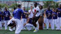 england-footballers-try-out-capoeira-in-rios-biggest-slum