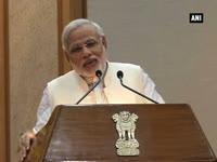 narendra-modi-releases-fifa-stamp