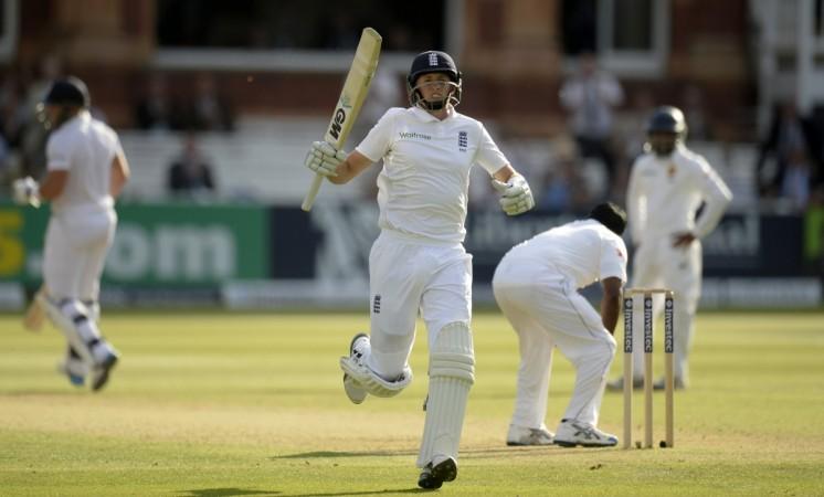 England's Joe Root celebrates after reaching his century against Sri Lanka at Lord's. Joe Root celebrates