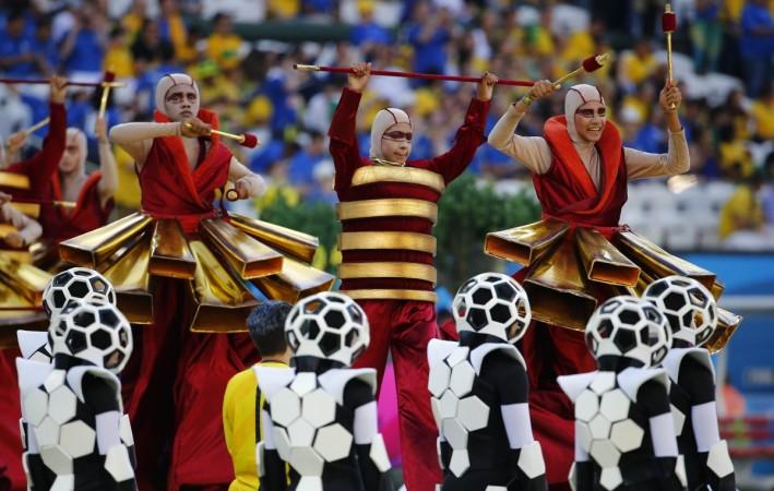 Performers dance during the opening ceremony of the 2014 World Cup at the Corinthians arena in Sao Paulo 2014 World Cup