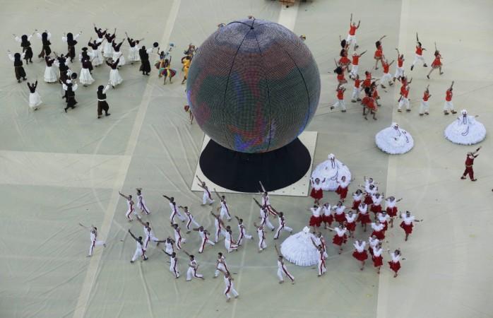 Performers take part in the 2014 World Cup opening ceremony at the Corinthians arena in Sao Paulo 2014 World Cup opening ceremony