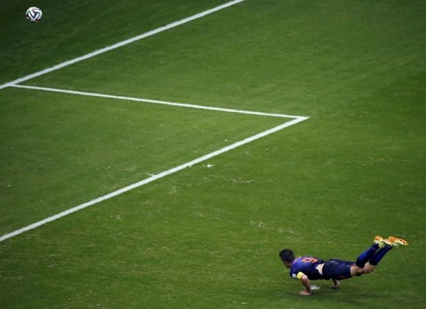 Netherlands captain Robin Van Persie scores a stunning goal against Spain in their World Cup Group B game, 13 June Robin Van Persie Netherlands